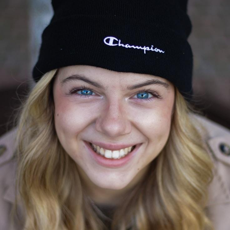 New name, Lead Design Curator at Forest Paper Nest, reviewing corporate floral arrangements